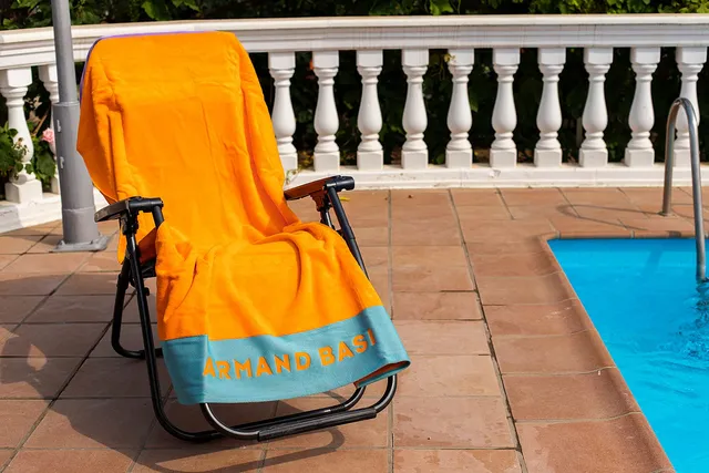 burrito-blanco-toalla-de-playa-armand-basi-62-naranja-100x180-cm-velour-100-algo image 1